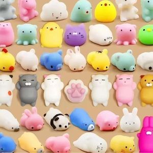 Get 5 Mochi Surprise squishy kawaii collectibles and 10 waterproof stickers